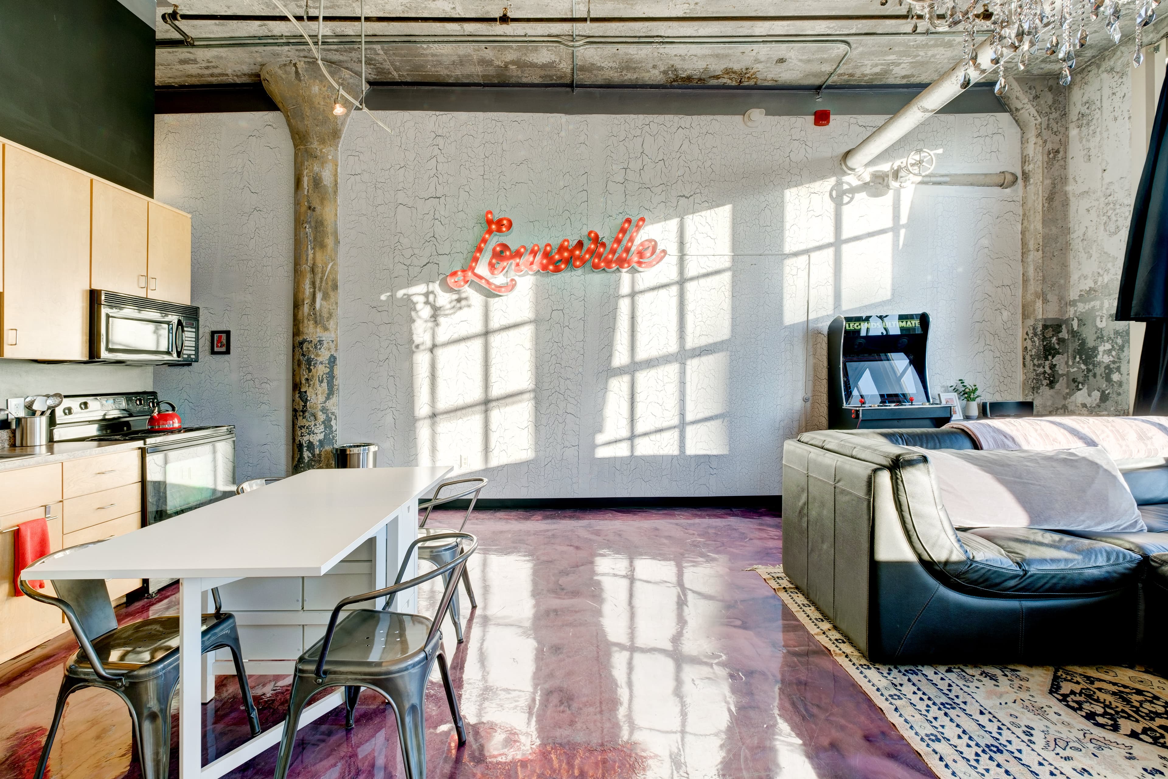 Open downtown Glassworks loft with large windows and city views